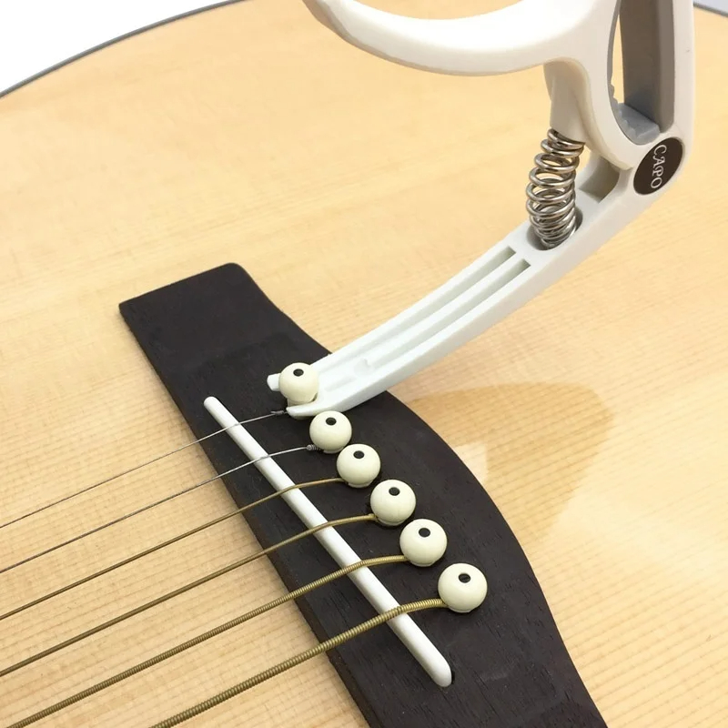 Plastic Guitar Capo for 6 Stri - Musical Instrument Gif review and price
